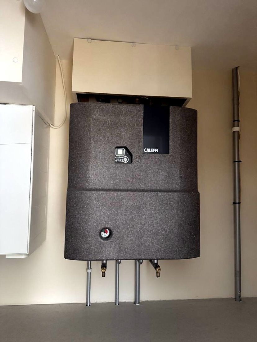 Heat interface unit on a wall